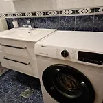 En Apartament *